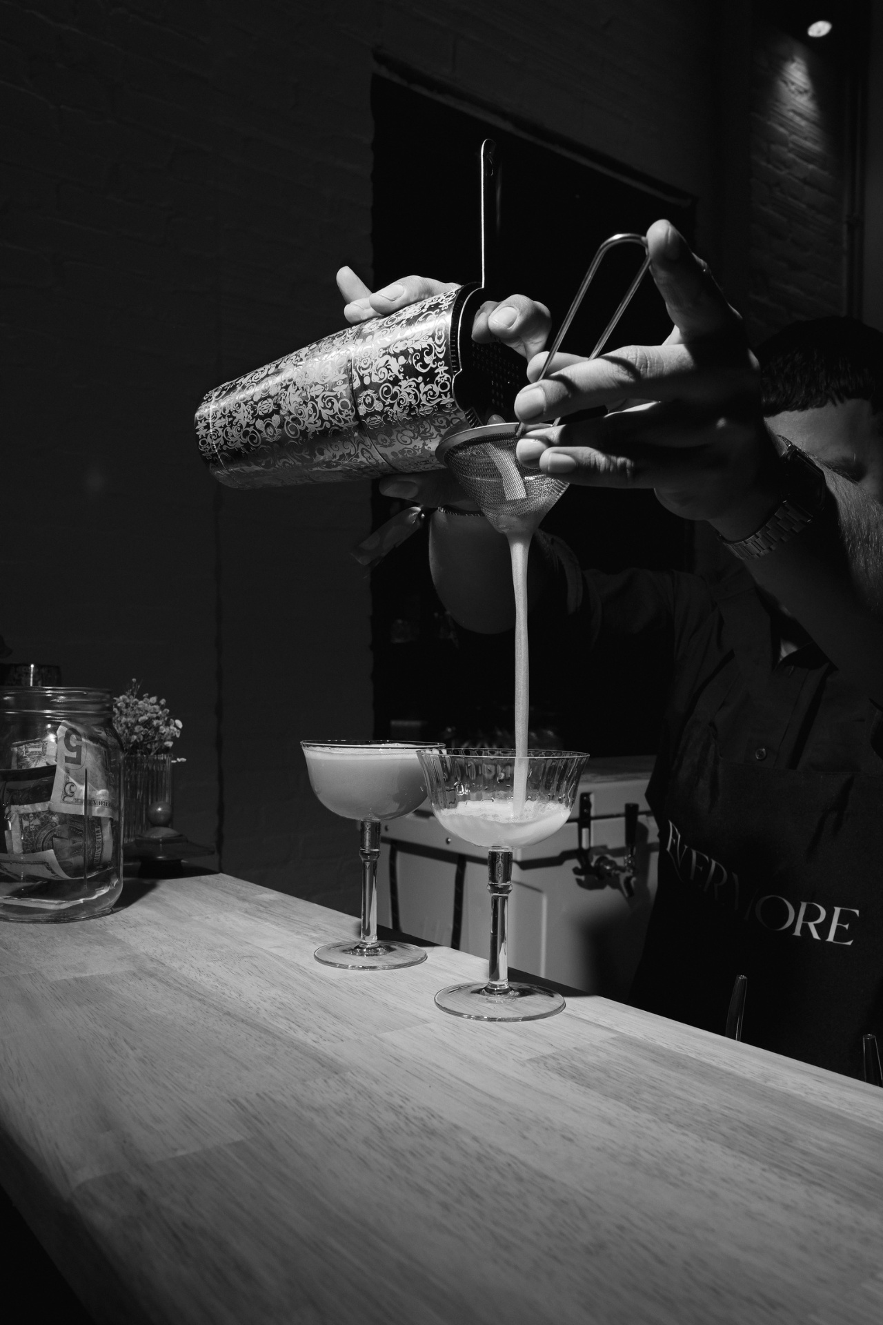 Bartender crafting cocktails at Evermore